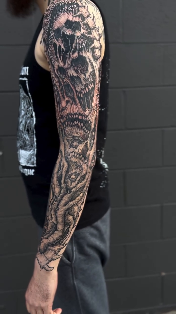 Tattoo by @kyleblacktattoos — dark_realism, black_and_grey