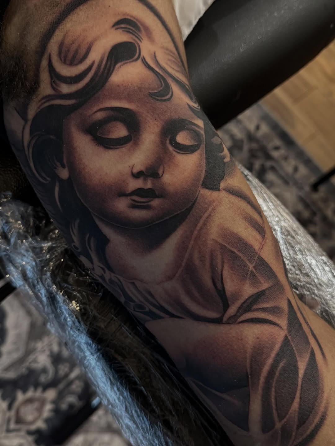 Tattoo by @angel_damiangg — realism, black_and_grey
