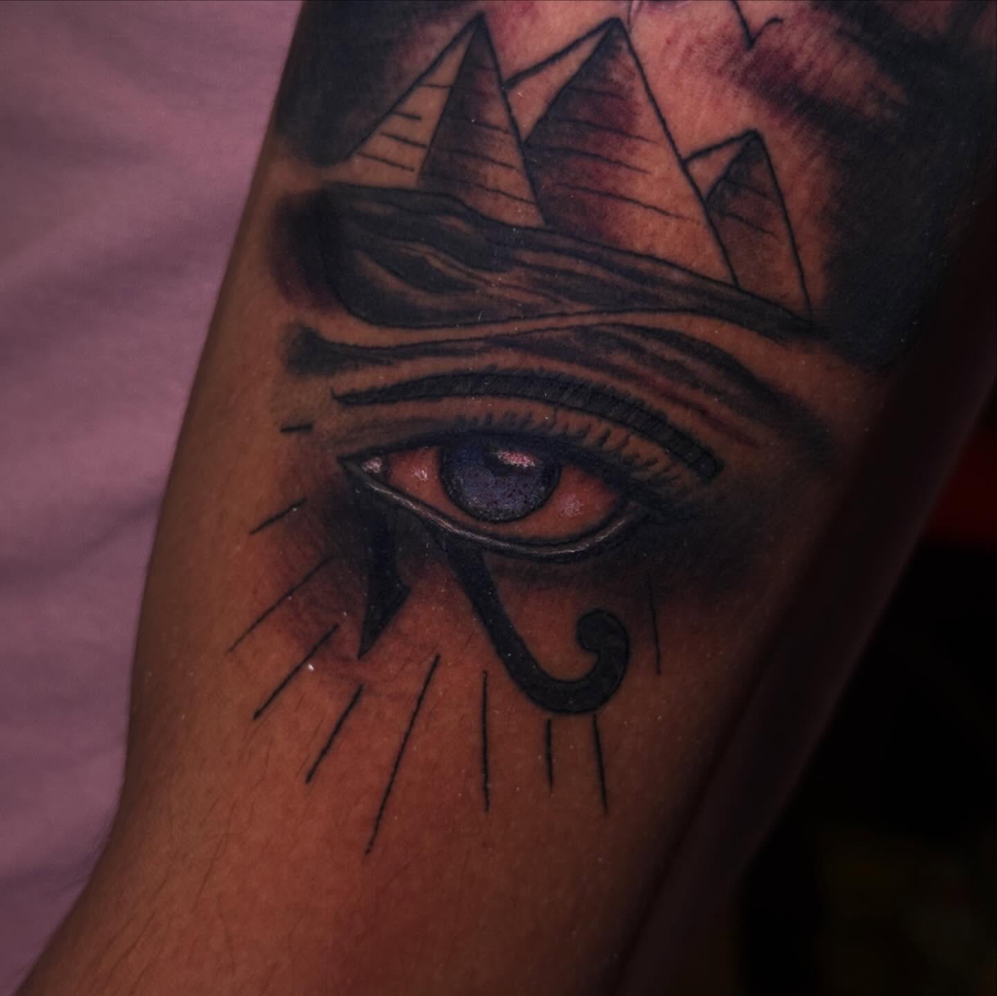 Eye of horus black and grey tattoo on the forearm by Mtctattoos