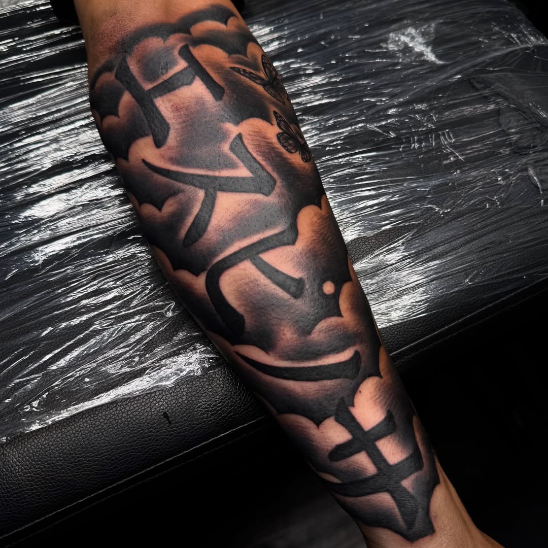 Abstract design geometric tattoo on the forearm by Elijah East