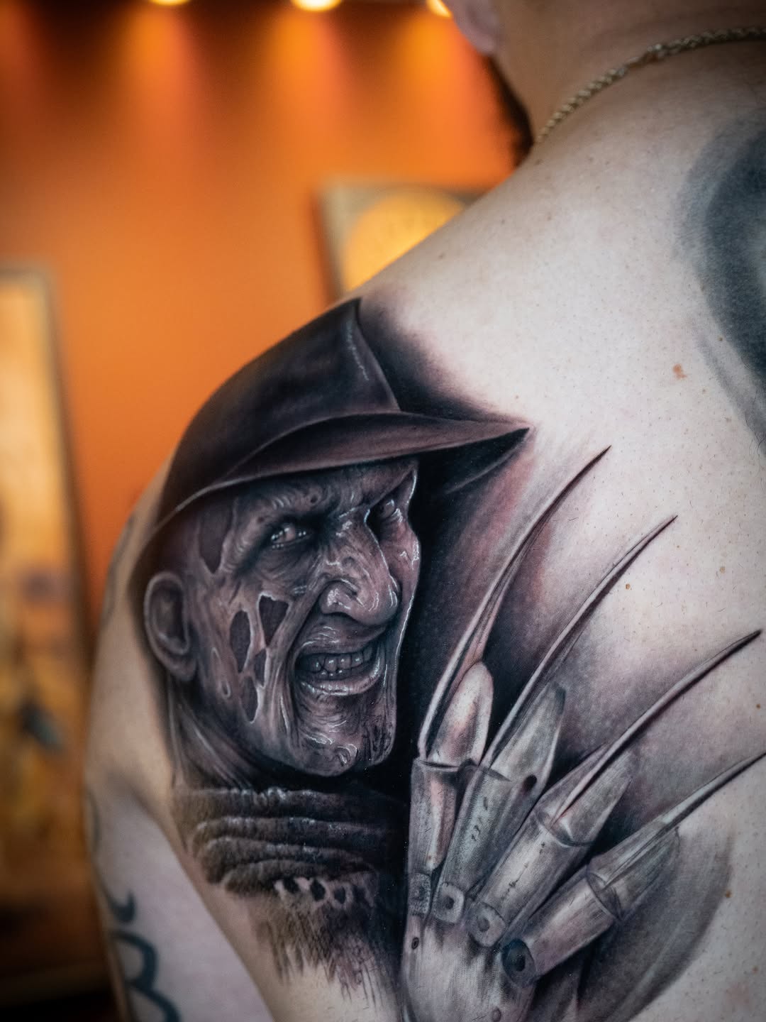 Freddy Krueger portrait realism tattoo on the shoulder by Franz Muñoz