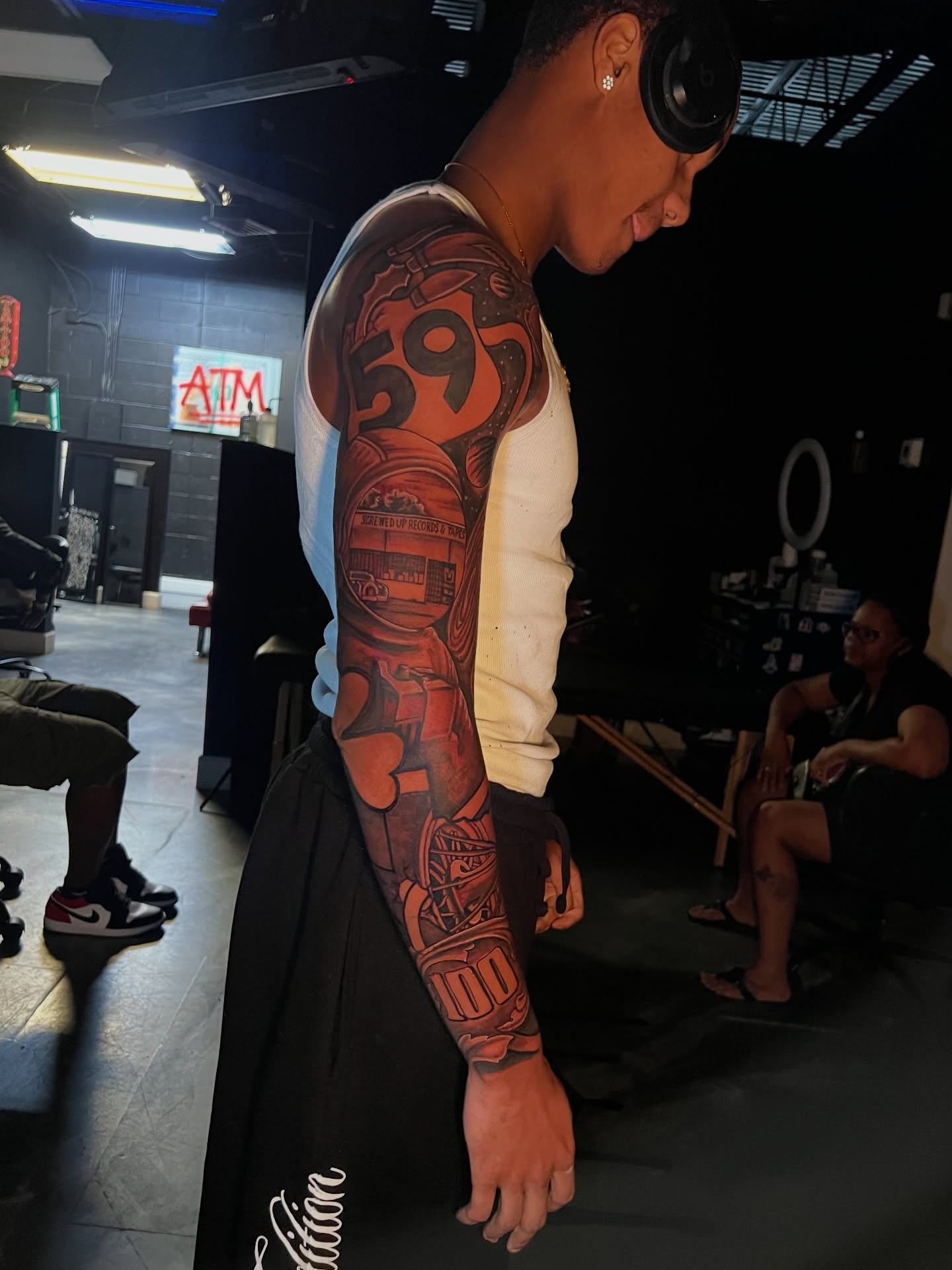 Number 59 American traditional tattoo on the forearm by Dee
