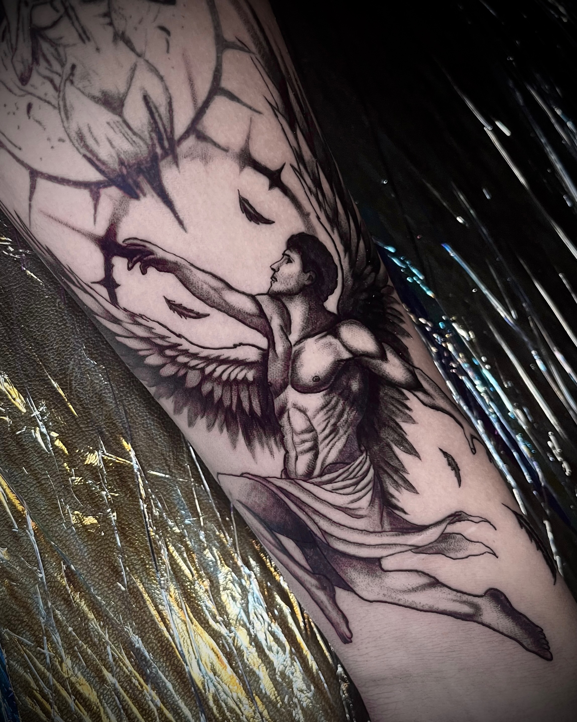 Angel black and grey tattoo on the forearm by Ryan Hindenach
