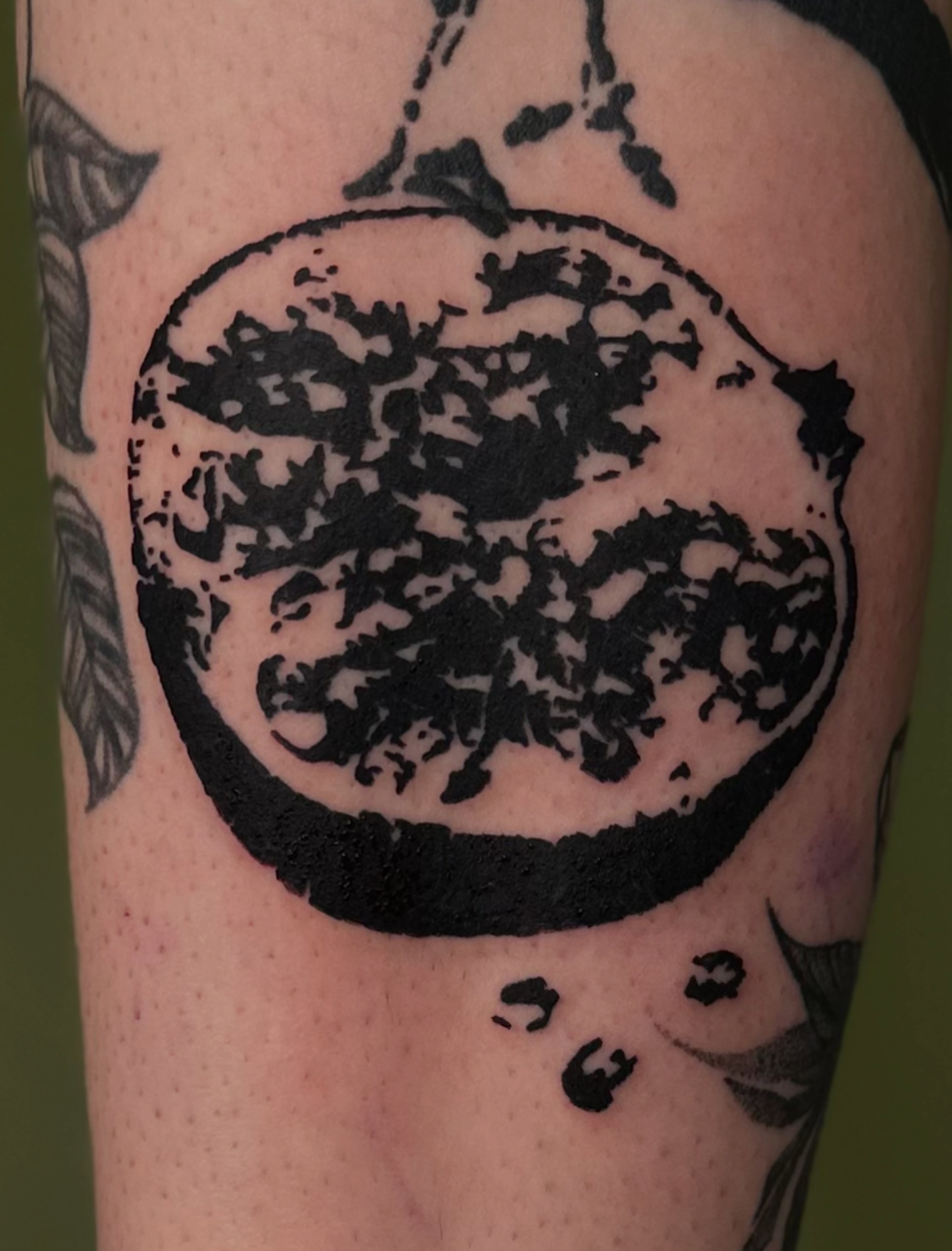 Moon black and grey tattoo on the forearm by Nikolas Tapio Aatos Mäkelä