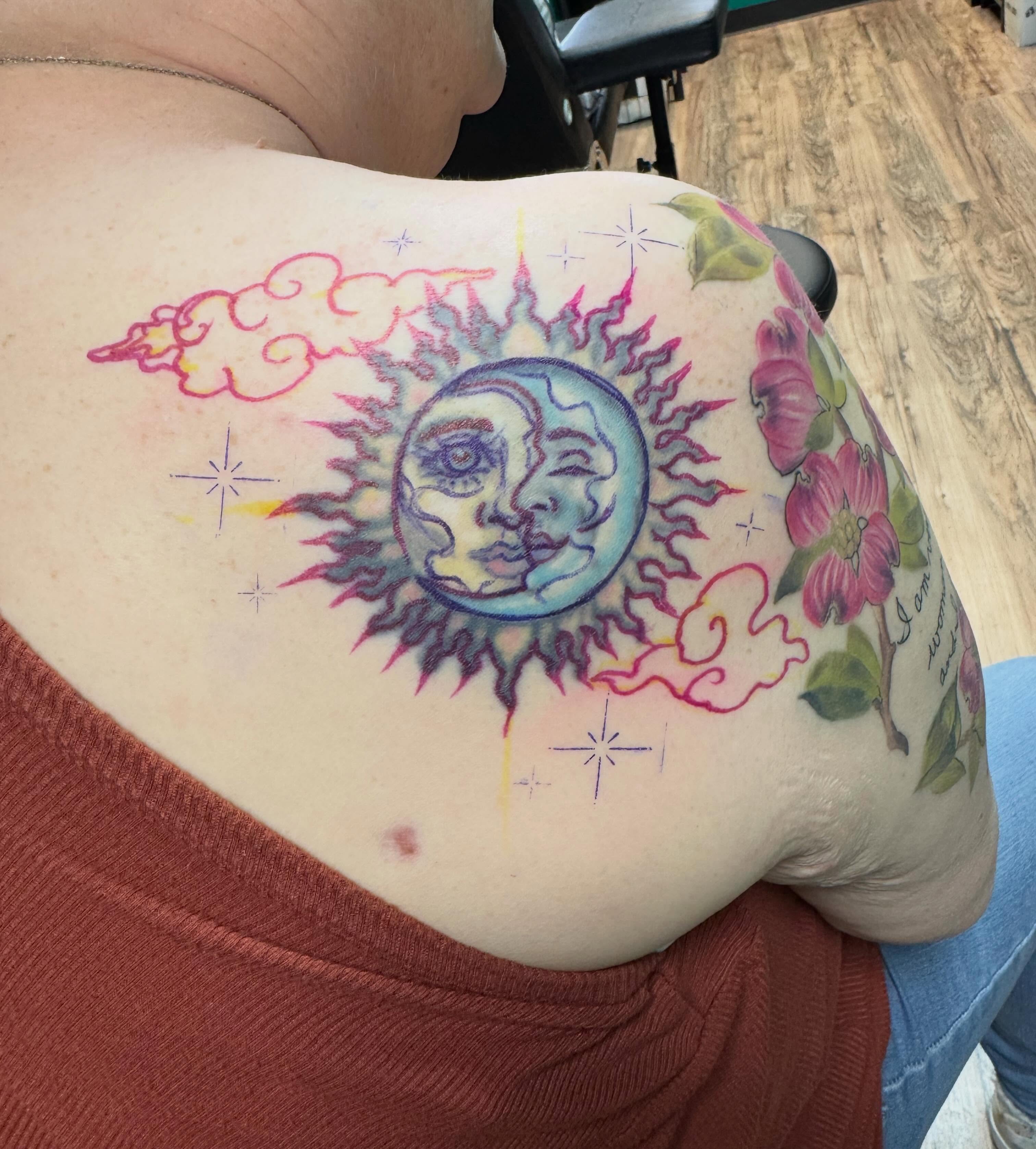 Sun and moon American traditional tattoo on the shoulder by Eileen Joyce