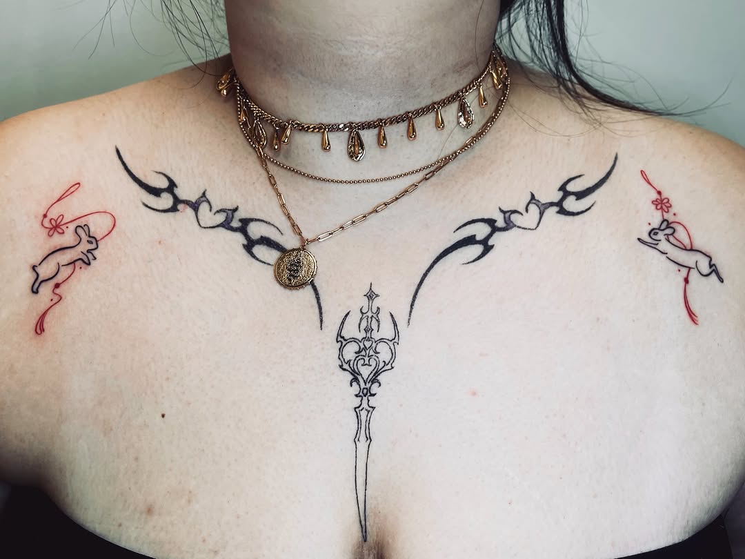 Rabbits and tribal design cyber sigilism tattoo on the chest by vivian