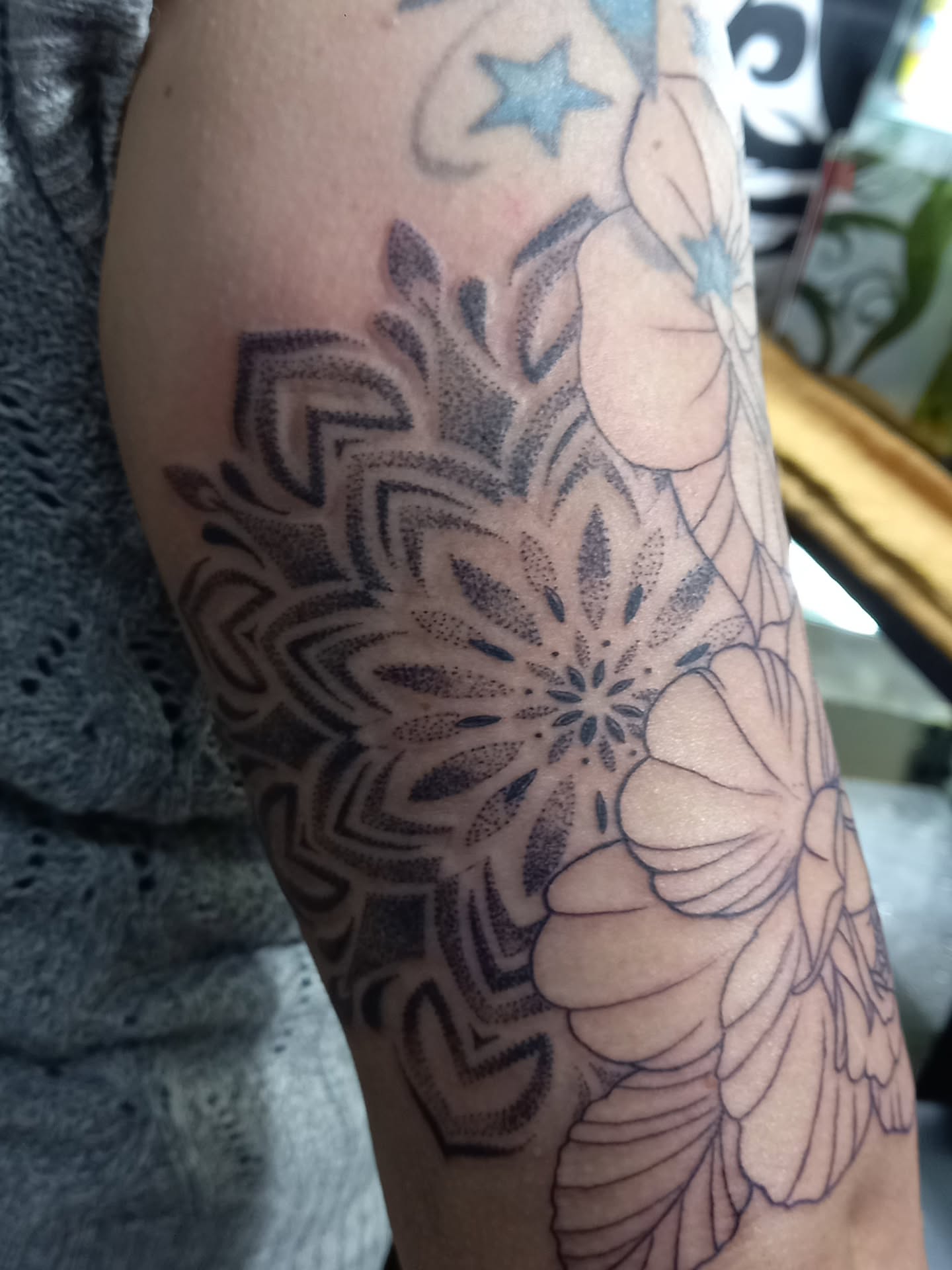 Floral mandala dotwork tattoo on the forearm by Jose Rodriguez
