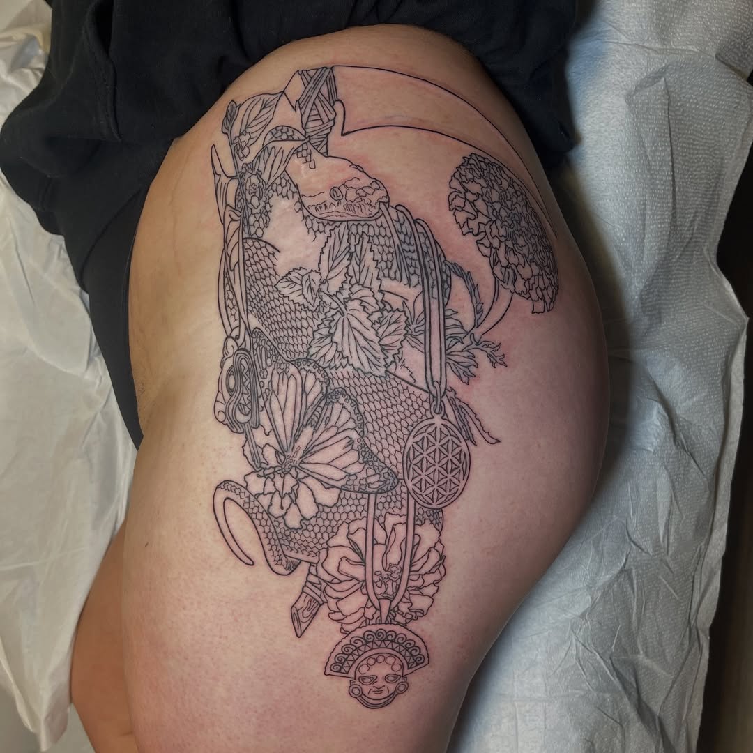 Snake with flowers and geometric symbols fine line tattoo on the thigh by Ashley Antolin
