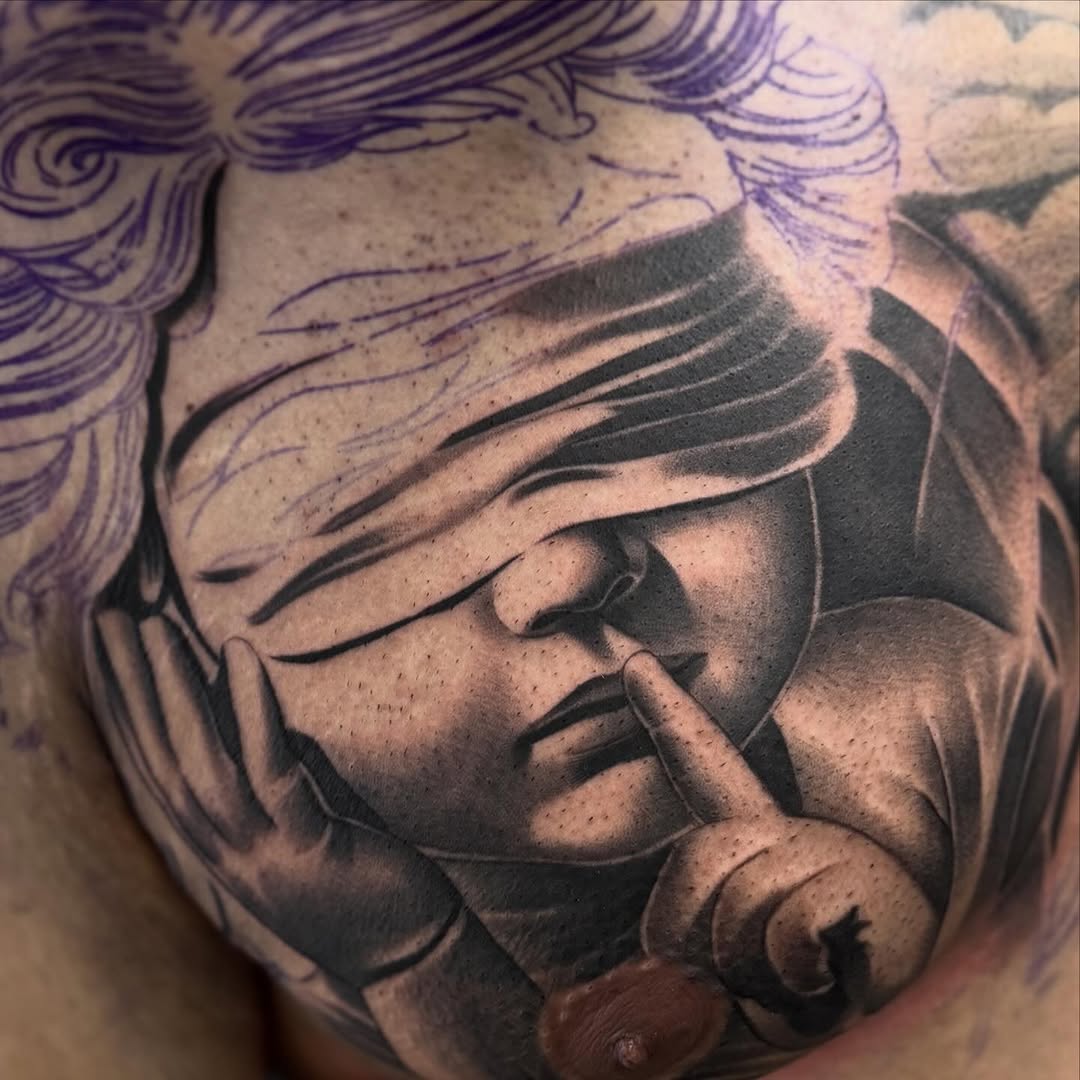 Tattoo by @angel_damiangg — realism, black_and_grey