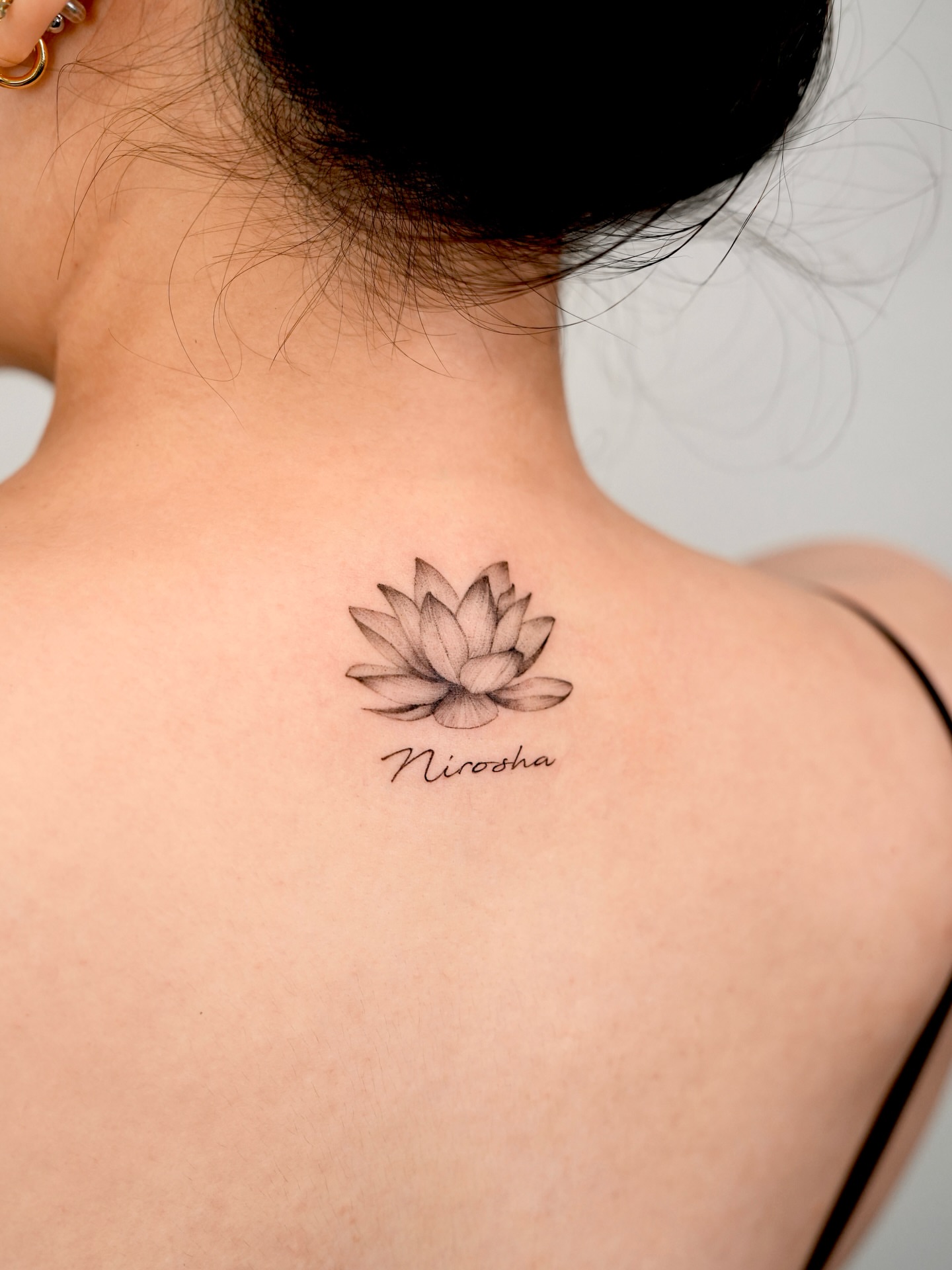 Lotus flower black and grey tattoo on the back by ⟡ 𝙶𝙰𝙾𝙽 ⟡ 제주타투 가온 Jejutattoo