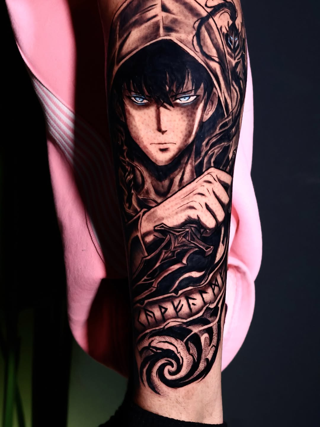 Anime character with sword and runes anime tattoo on the forearm by German Patiño.