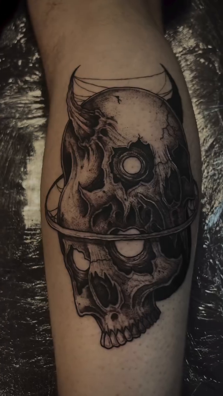 Tattoo by @scorchedbones_ — dark_realism, black_and_grey