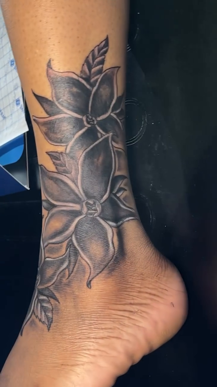 Floral ankle cover-up fine line tattoo on the calf by TC 🧚🏽, Columbus, OH