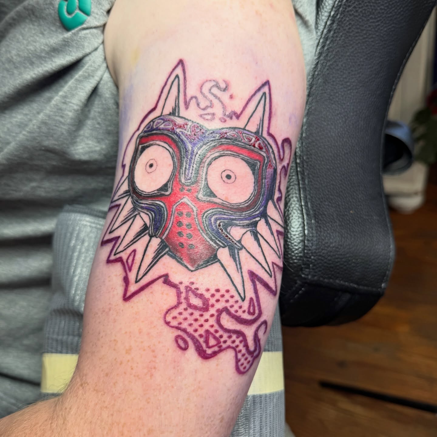 Mask dotwork tattoo on the forearm by Eric Burns - NoVA Tattoo Artist
