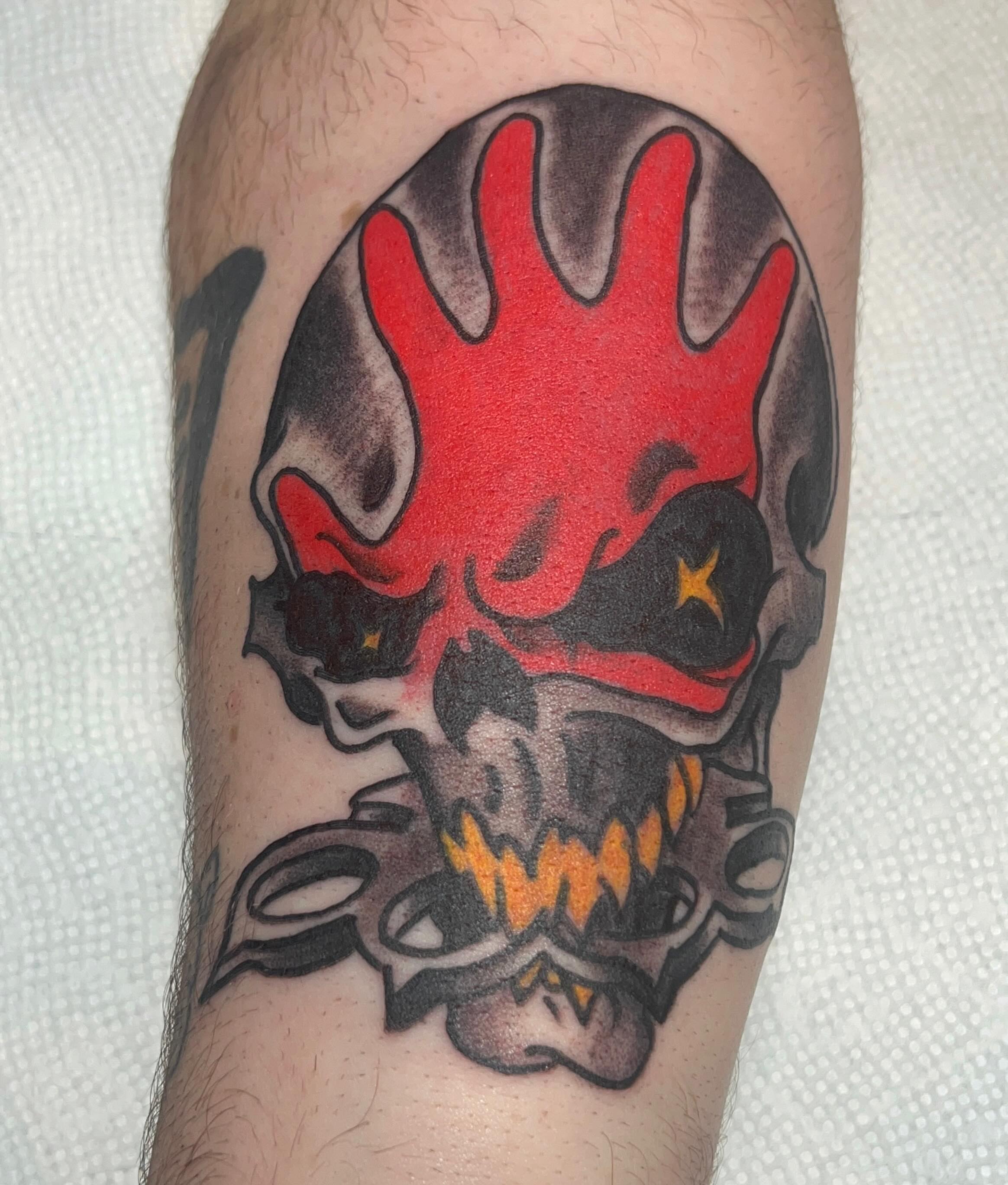 Skull with flame American traditional tattoo on the forearm by Casey Lewis - Tattoo Artist, Cleveland Ohio