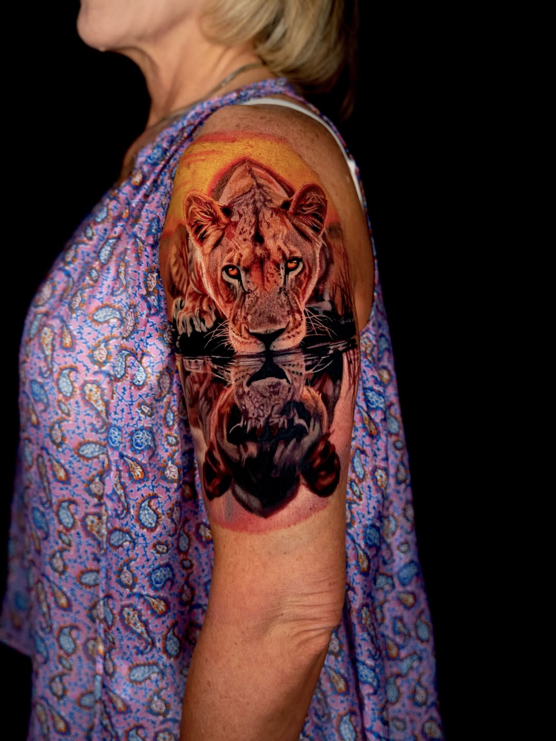 Lioness reflection realism tattoo on the shoulder by B R A D C H A R L e S
