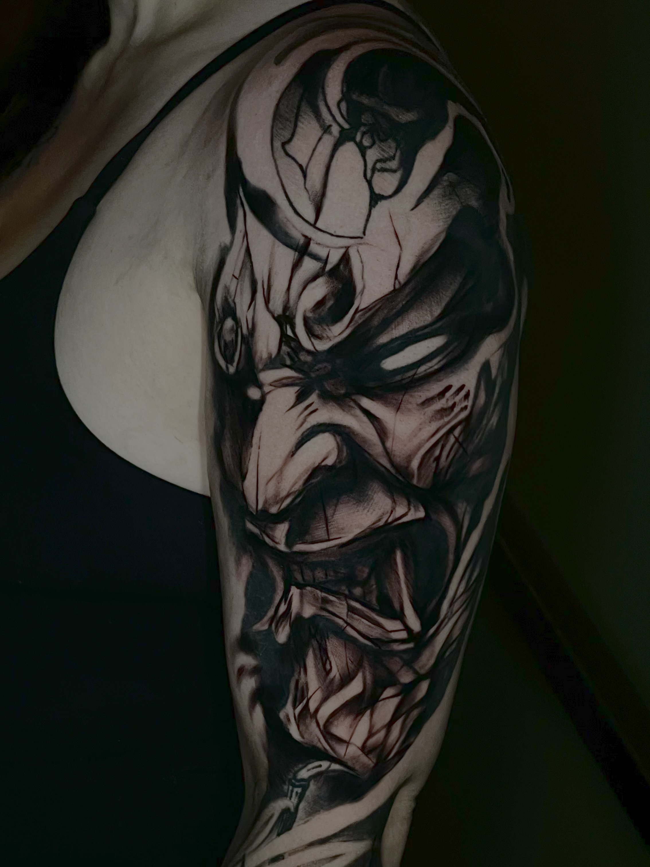 Muscular torso realism tattoo on the chest by Dean Rogers
