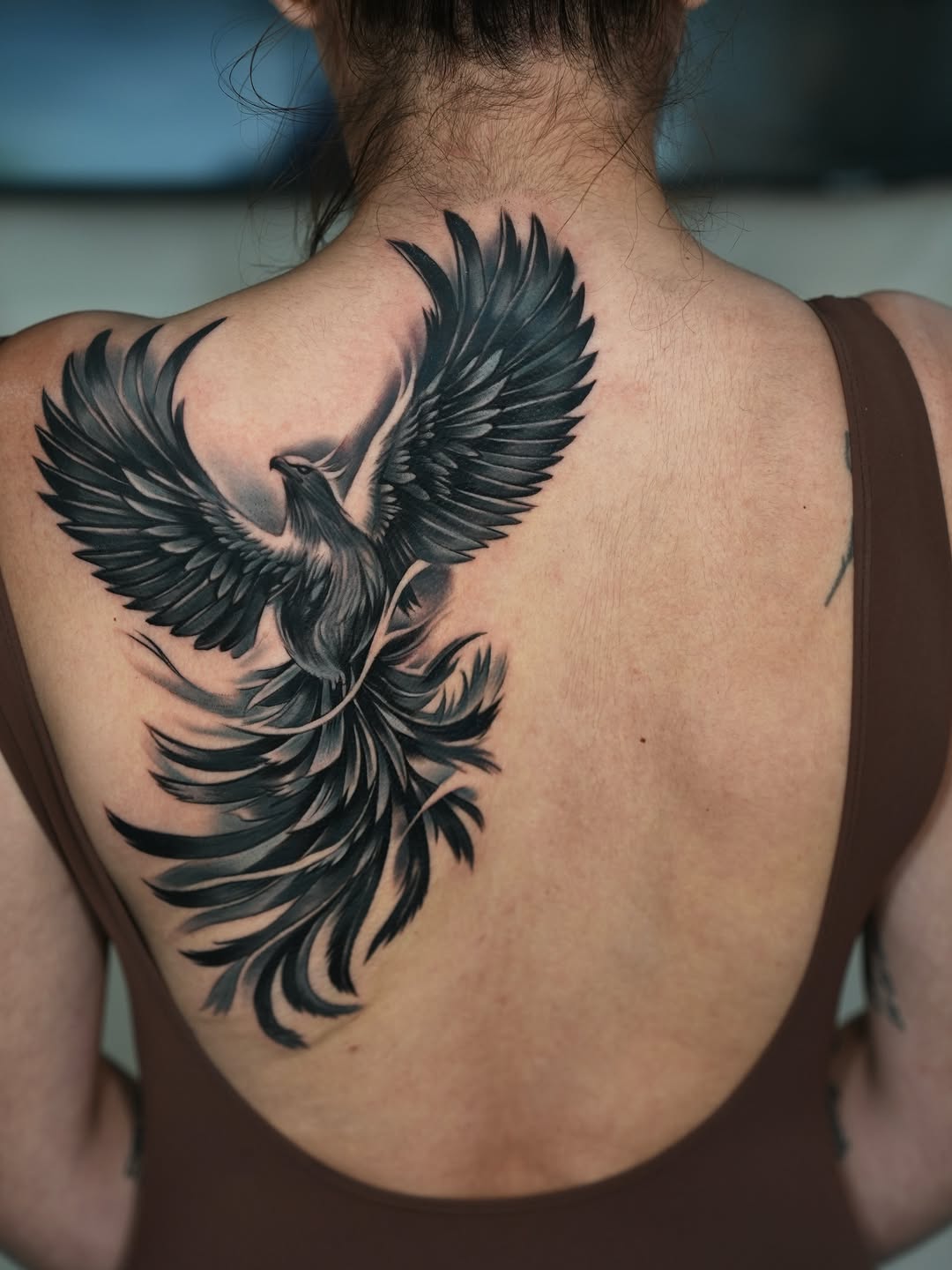 Phoenix realism tattoo on the back by Luis Manuel Olivera, North Miami, Florida
