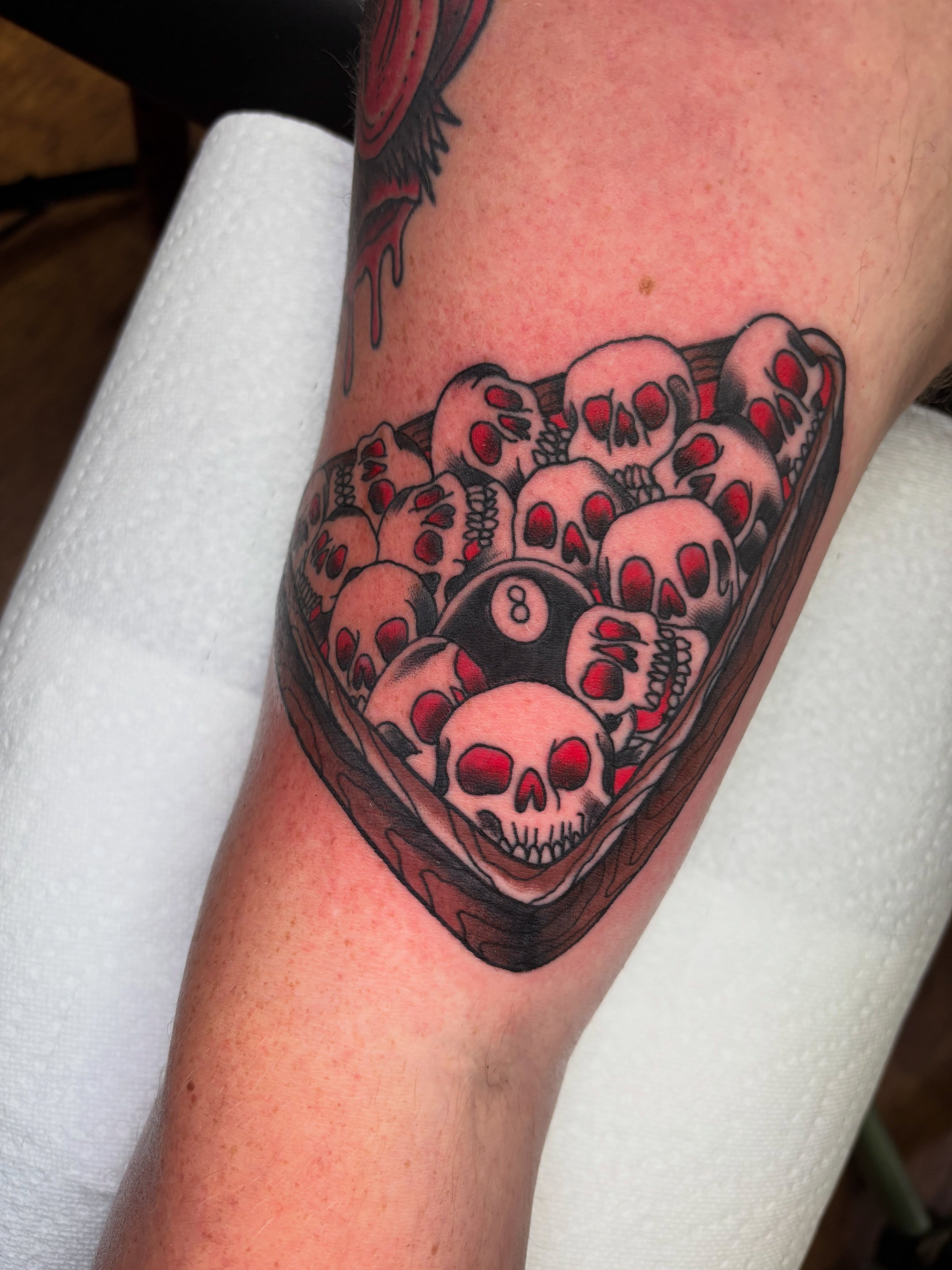 Pool balls and skulls American traditional tattoo on the forearm by AARON MASTERS - Tattoo Artist