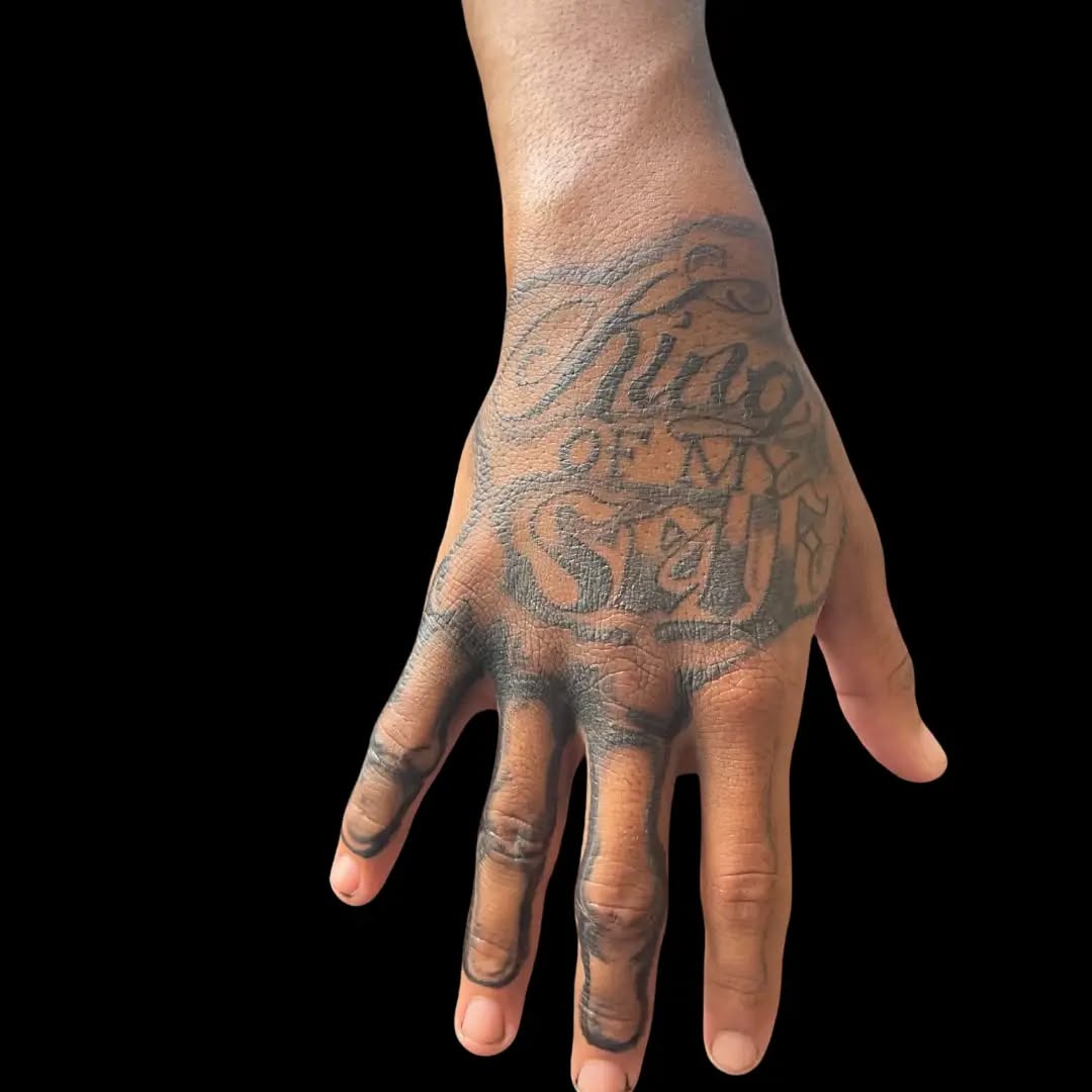 King of My Self lettering lettering tattoo on the hand by Hood