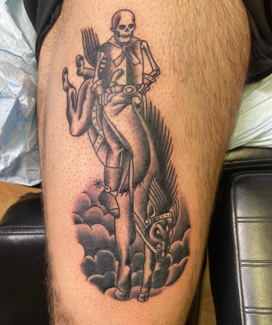 Skeleton riding a winged horse realism tattoo on the thigh by Bryan Hunt