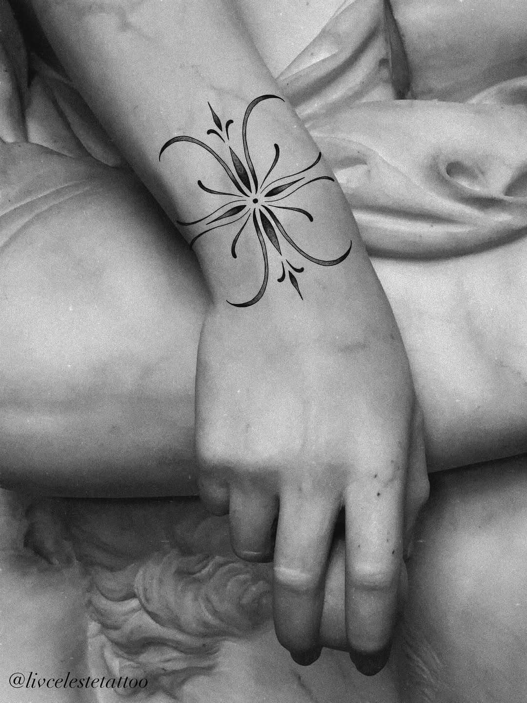Abstract floral design tattoo on the forearm by ༻❁༺ ⟡ 𝑳𝒊𝒗 𝑪𝒆𝒍𝒆𝒔𝒕𝒆 ⟡ ༻❁༺