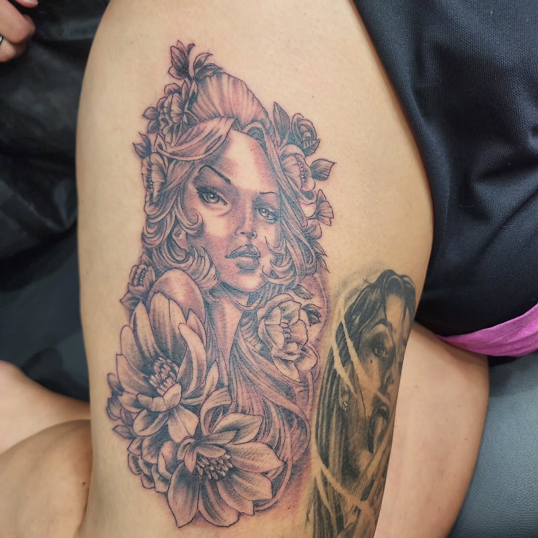 Tattoo by @j.garcia_tattooz — chicano, black_and_grey