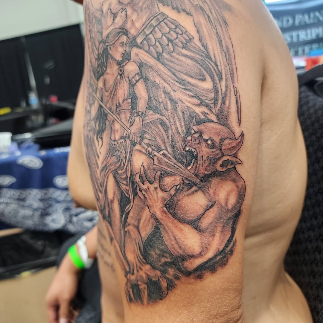 Tattoo by @j.garcia_tattooz — dark_realism, black_and_grey