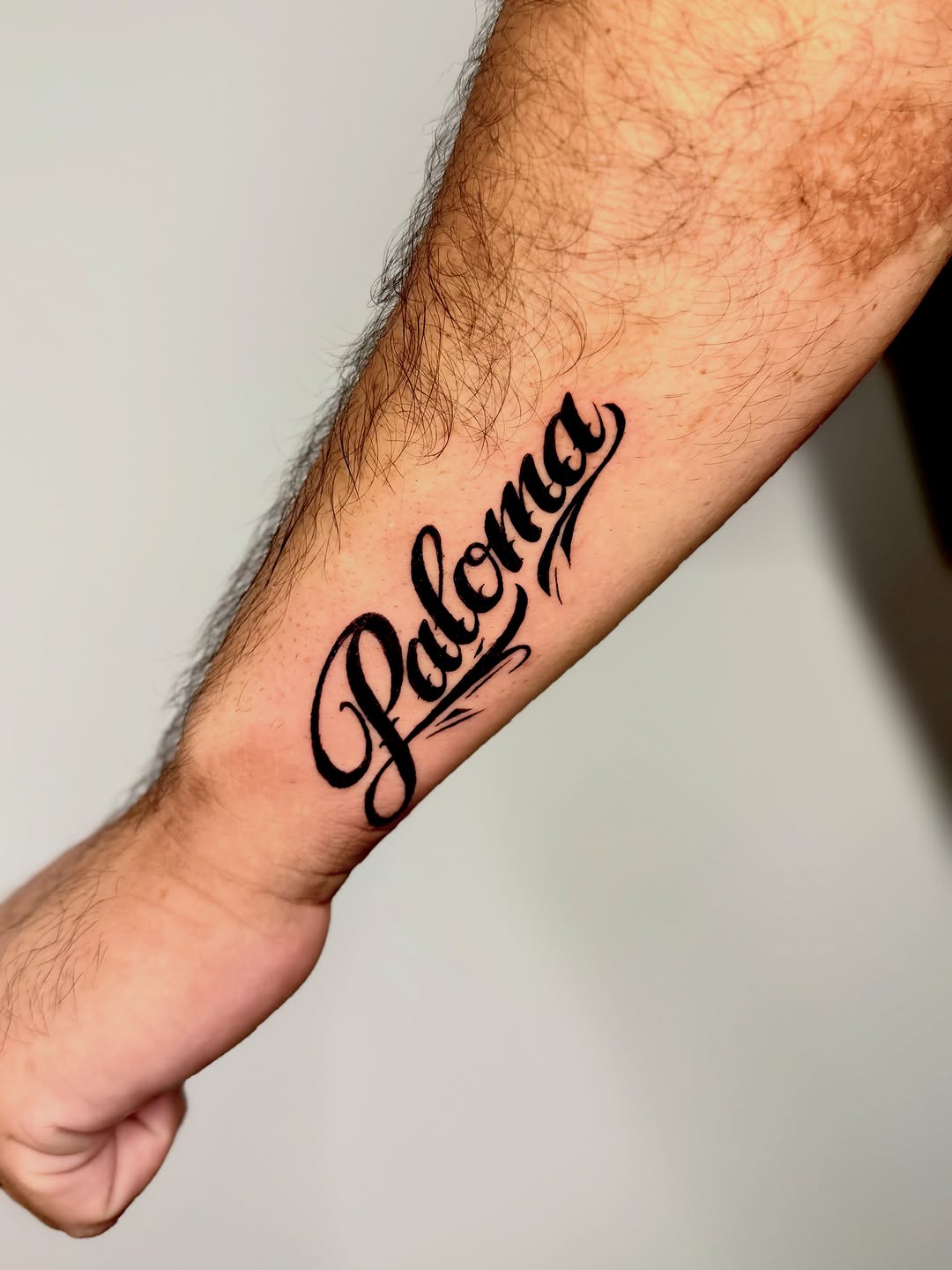 Paloma name tattoo lettering tattoo on the forearm by Orca