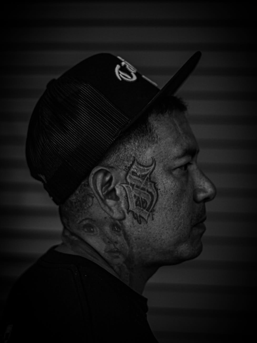 Tattoo by @desmond_tattoos — lettering_script, black_and_grey