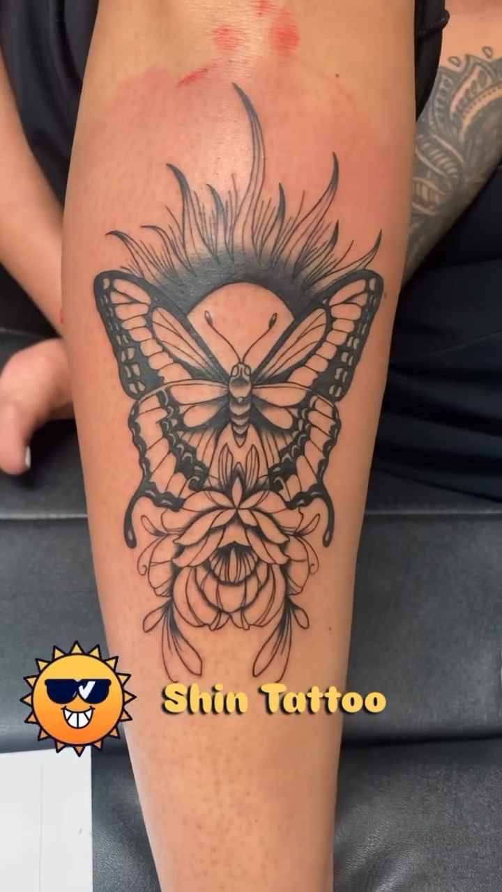Butterfly and rose tattoo fine line tattoo on the leg by Timothy Murtaugh