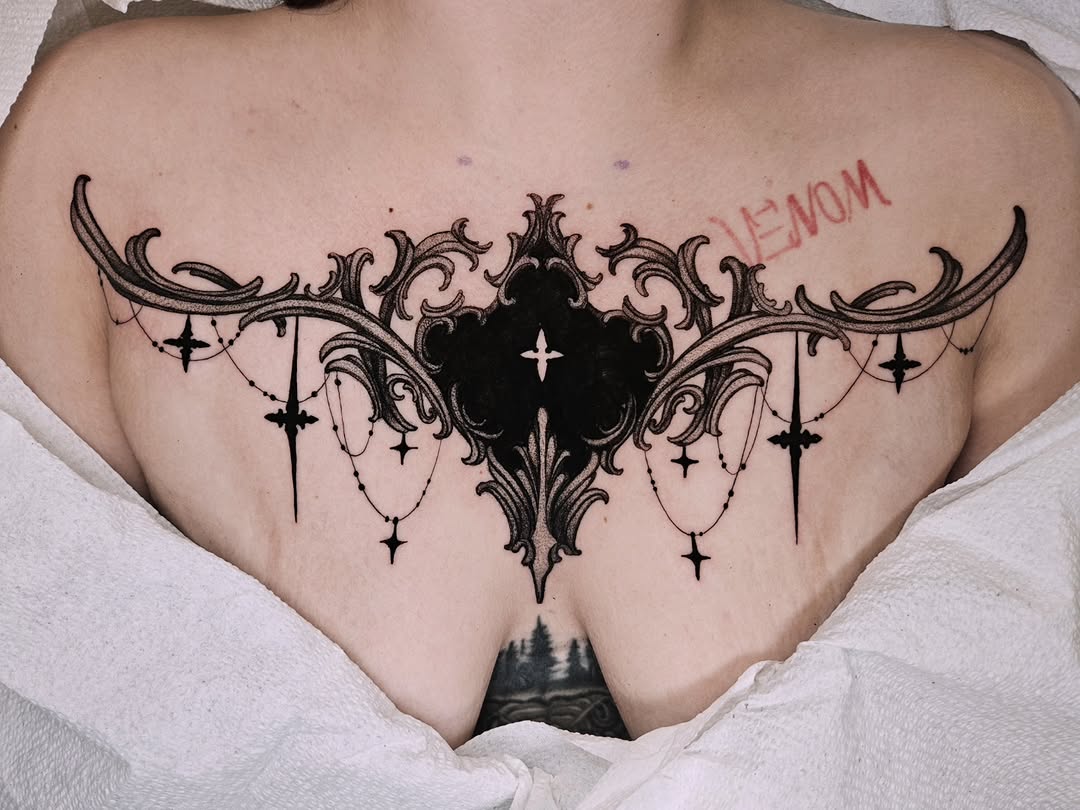 Tattoo by @fermented_ink — ornamental, blackwork