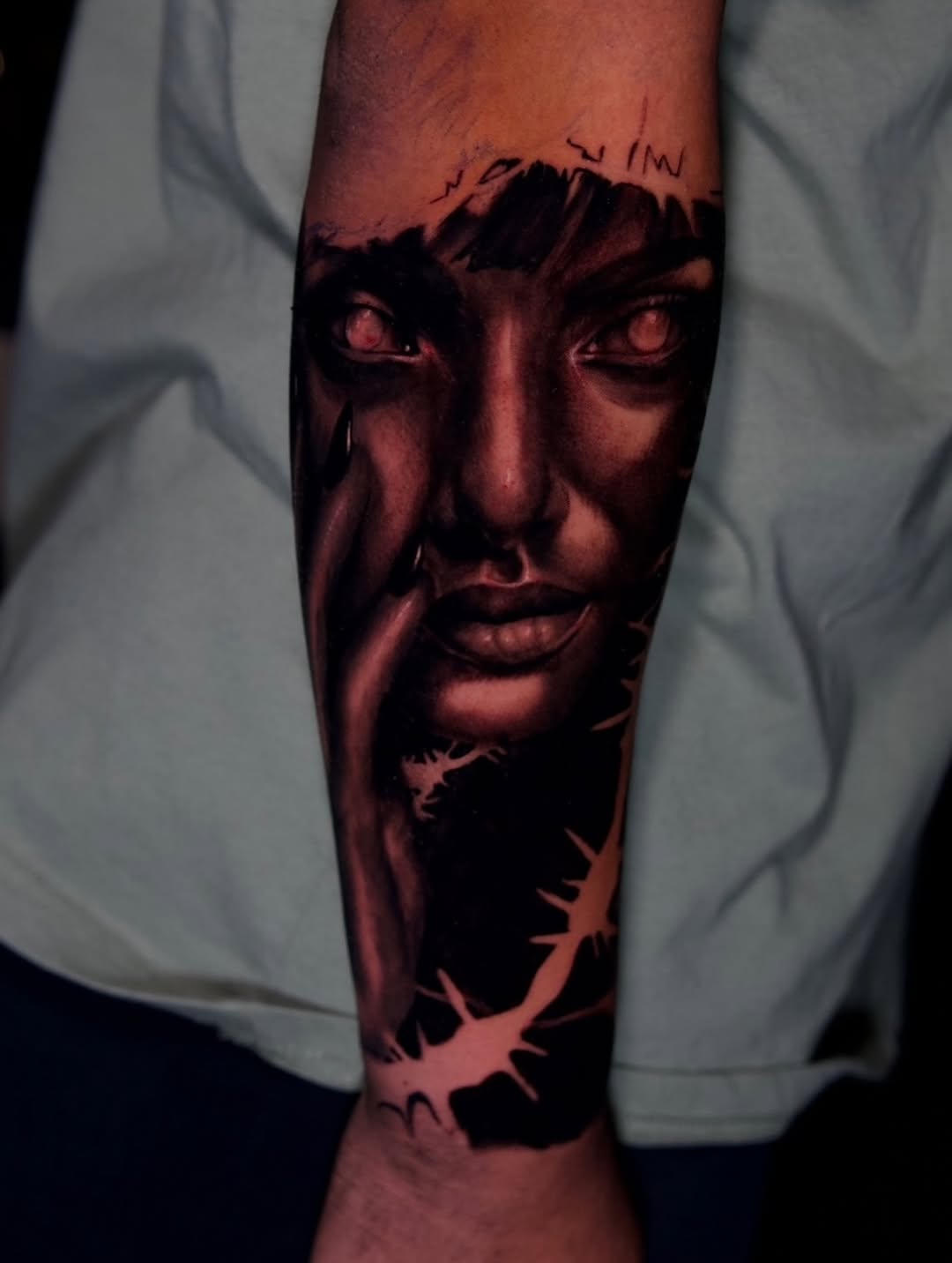 Sorrowful woman's face realism tattoo on the forearm by ᴅᴀʟʟᴀꜱ ᴛᴀᴛᴛᴏᴏ ᴀʀᴛɪꜱᴛ