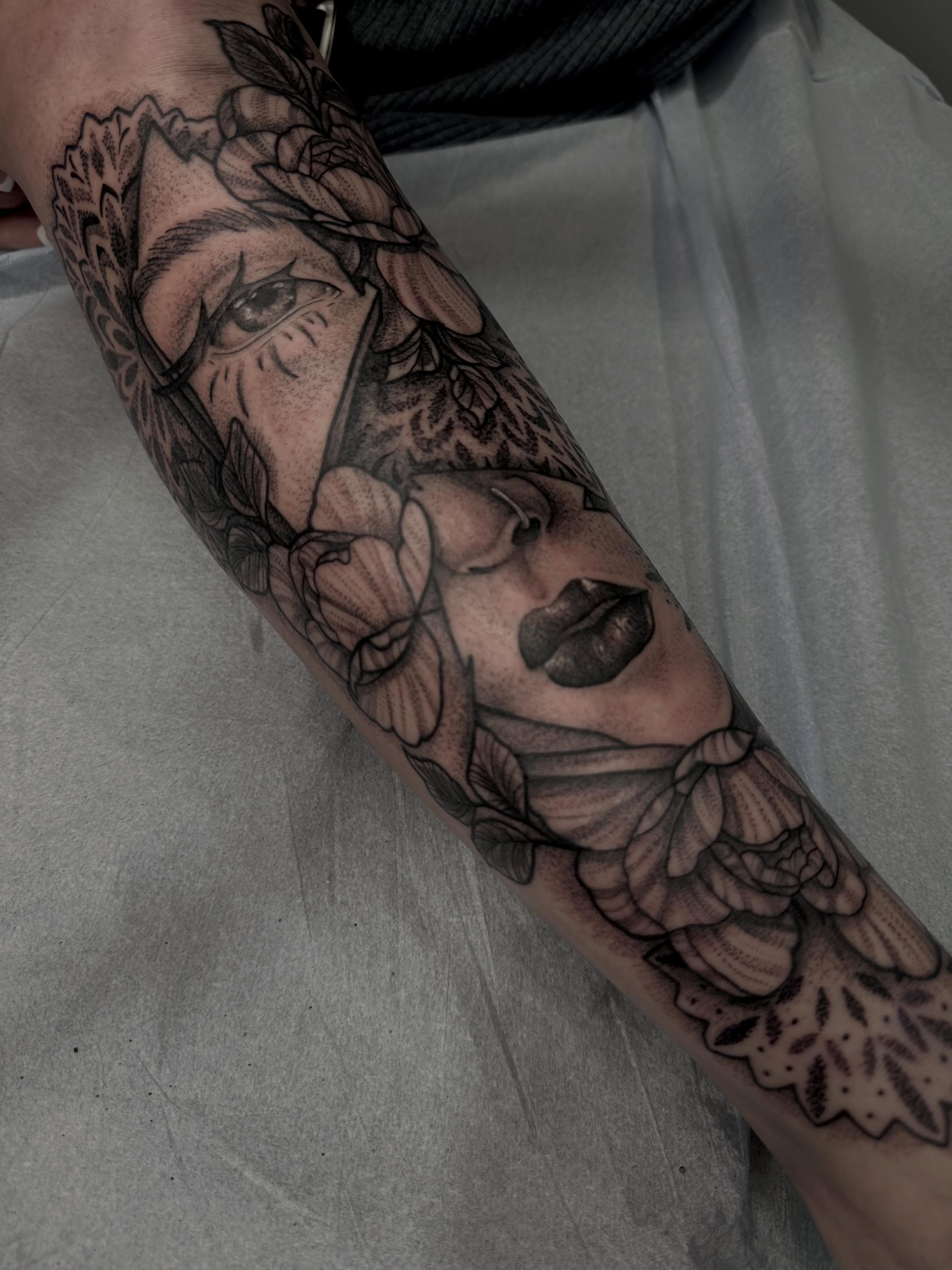 Floral portrait realism tattoo on the forearm by Destiny Tolman