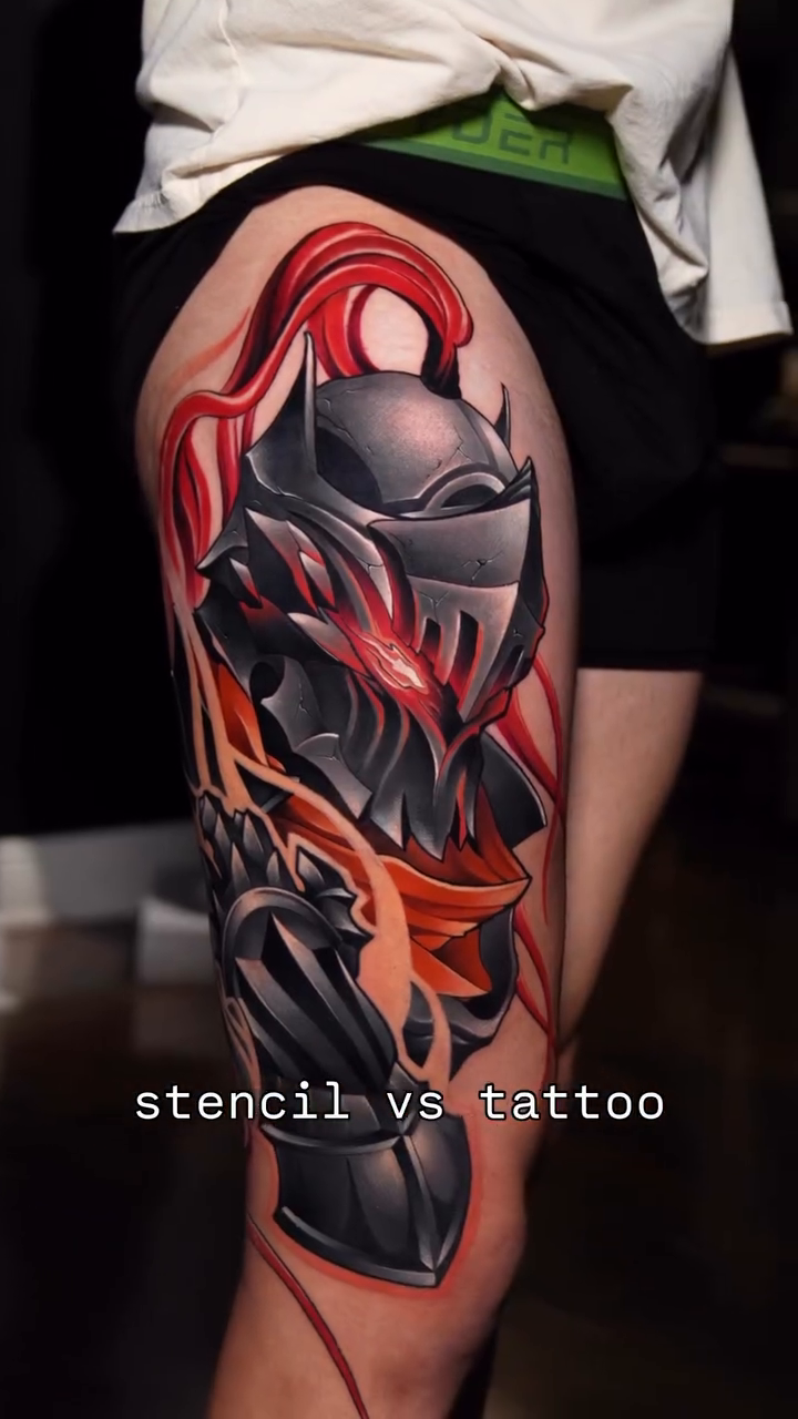 Knight's helmet with red accents dark art tattoo on the thigh by CRISTIAN AMORES シ