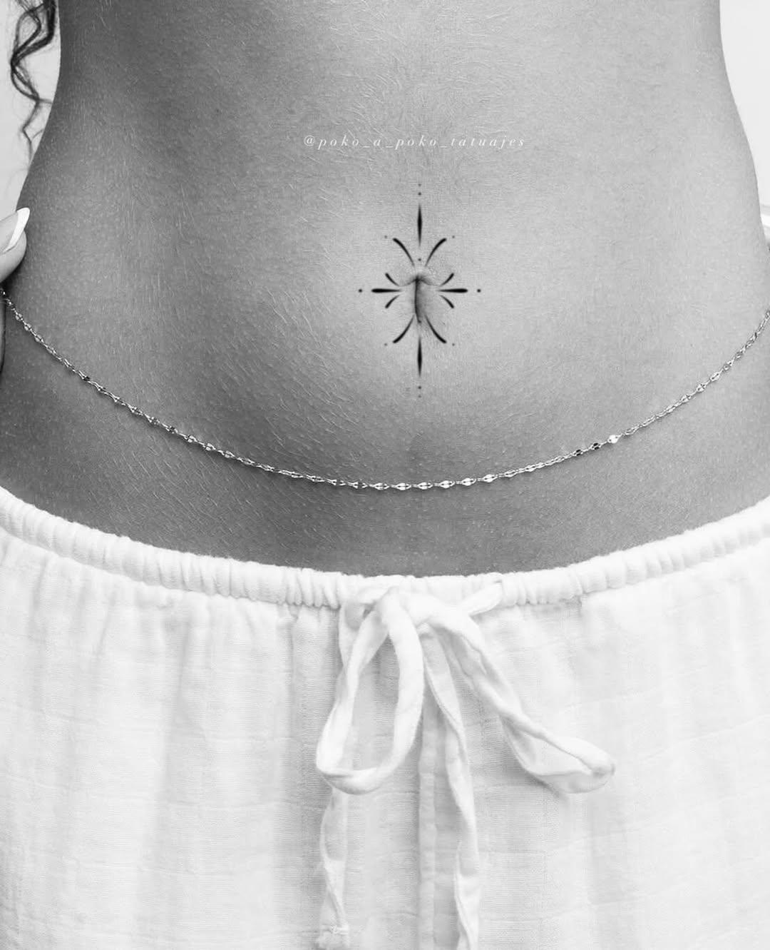 Geometric starburst tattoo on the torso by @ethereal.ornamentalism