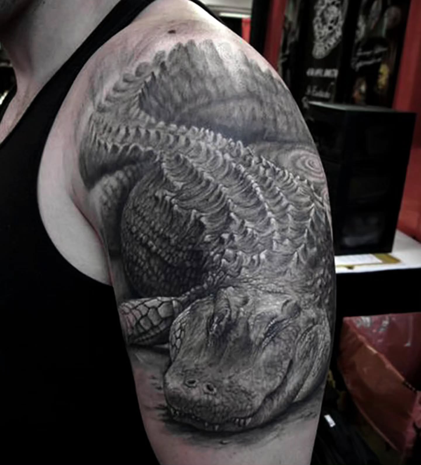Alligator realism tattoo on the upper arm by Stefano Alcantara