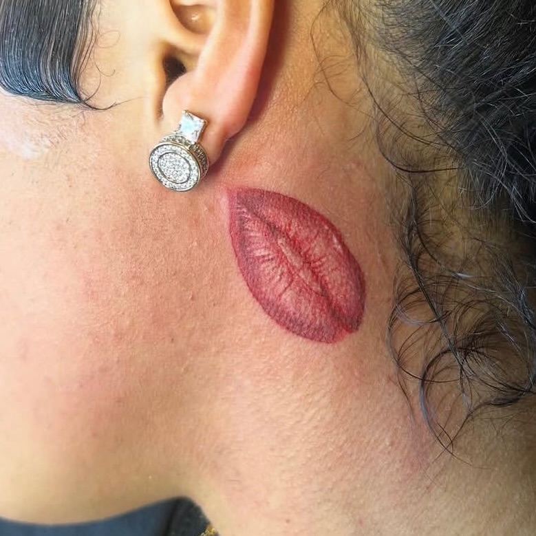Kiss print tattoo on the neck by Vanessa - Dallas Artist