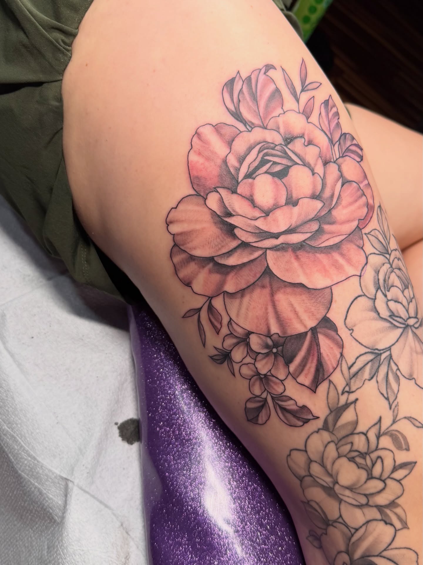 Peony realism tattoo on the thigh by TyAnne Schulte