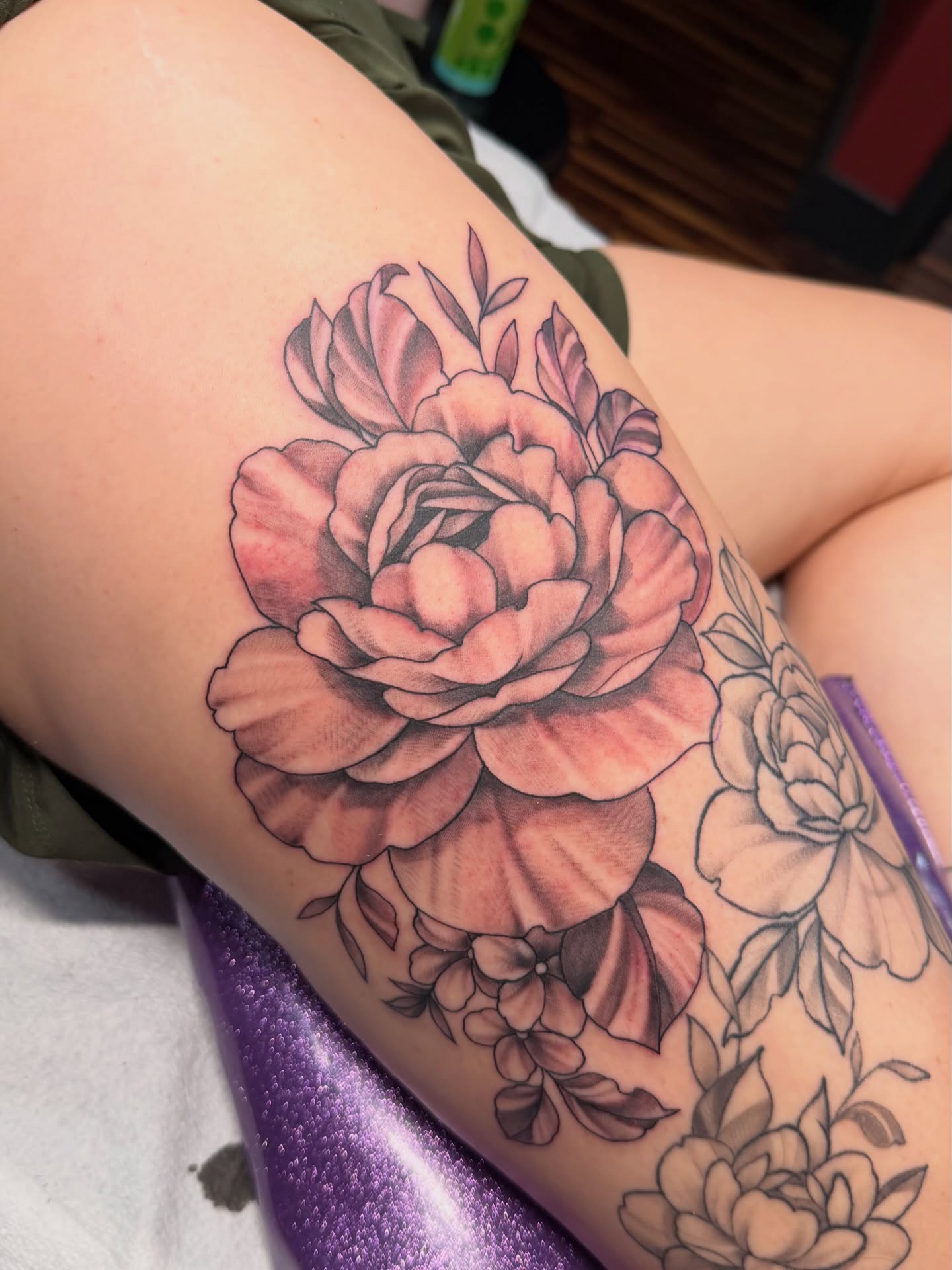 Peony realism tattoo on the thigh by TyAnne Schulte