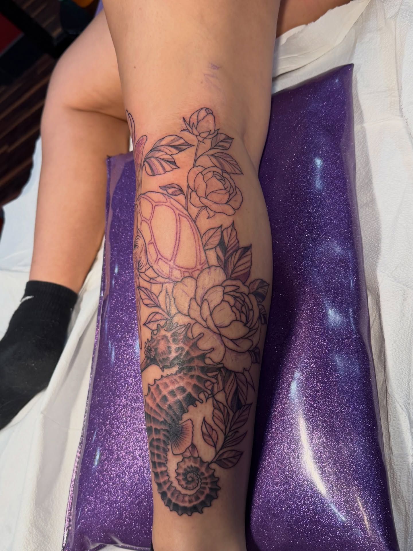 Seahorse and roses realism tattoo on the forearm by TyAnne Schulte