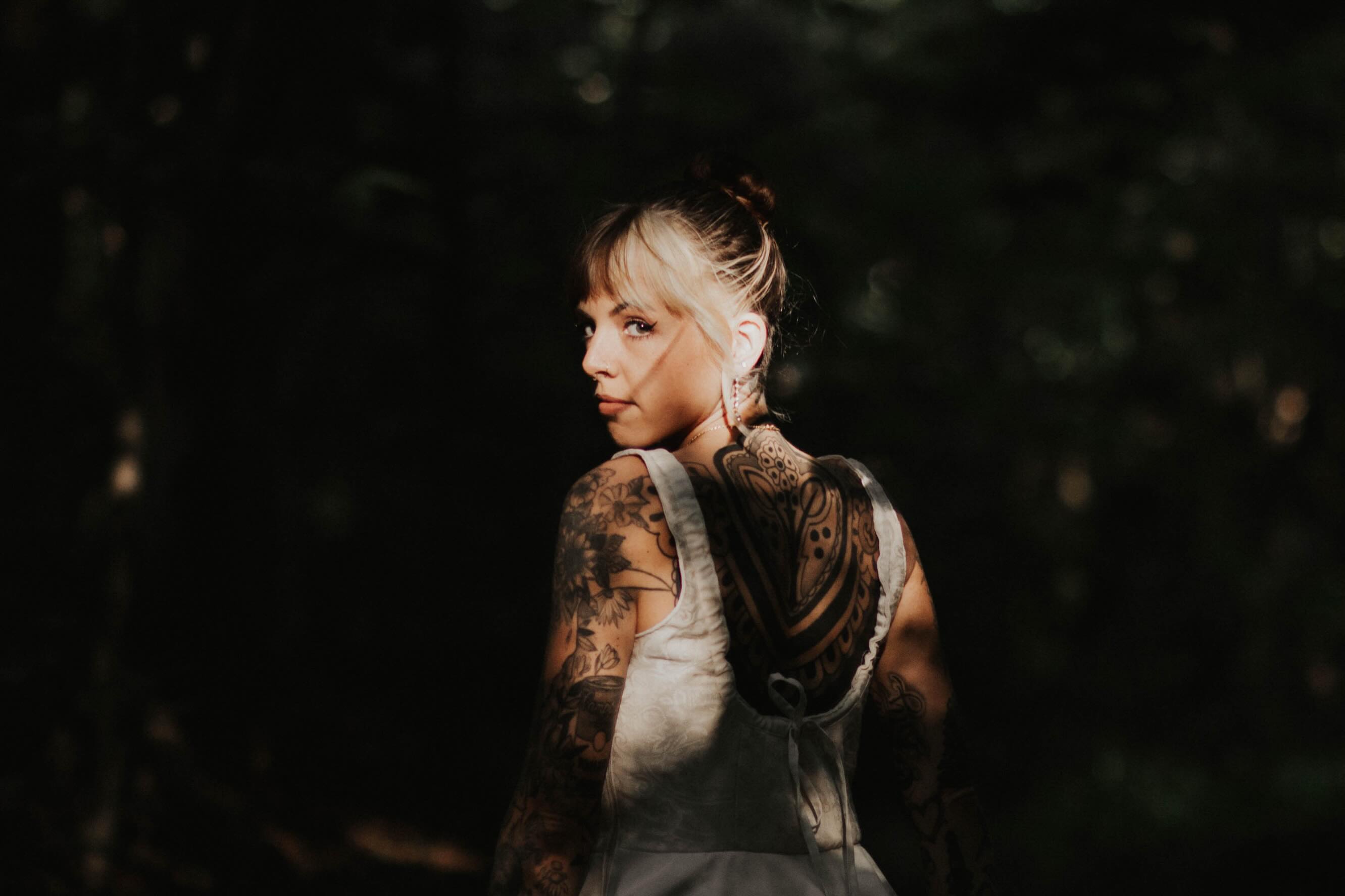 Tattooed back black and grey tattoo on the back by Audrey Kacel, Holland, Michigan