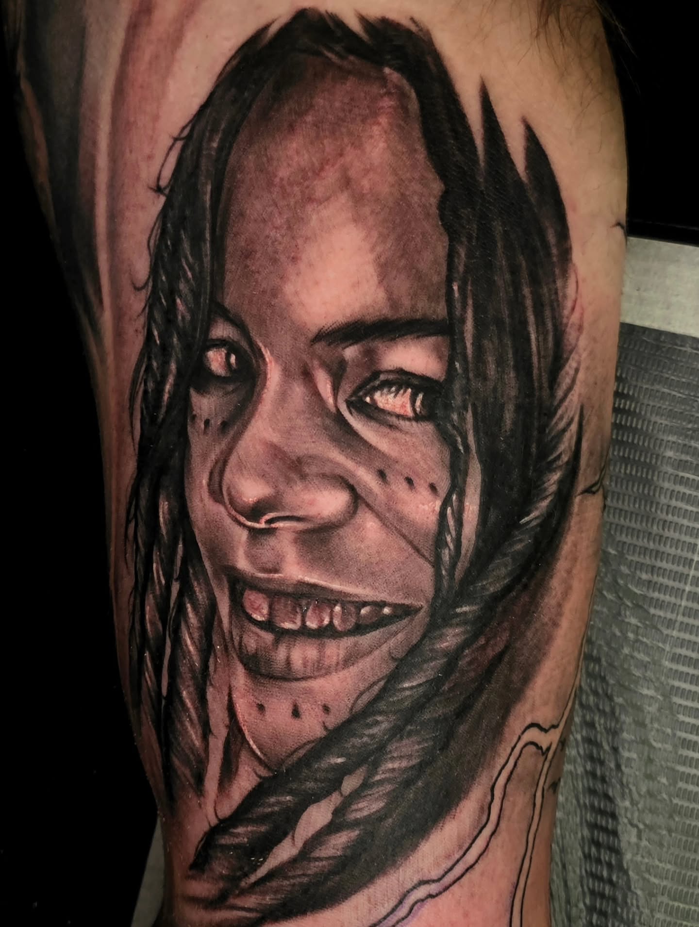 Horror character realism tattoo on the forearm by Christian Mulvey