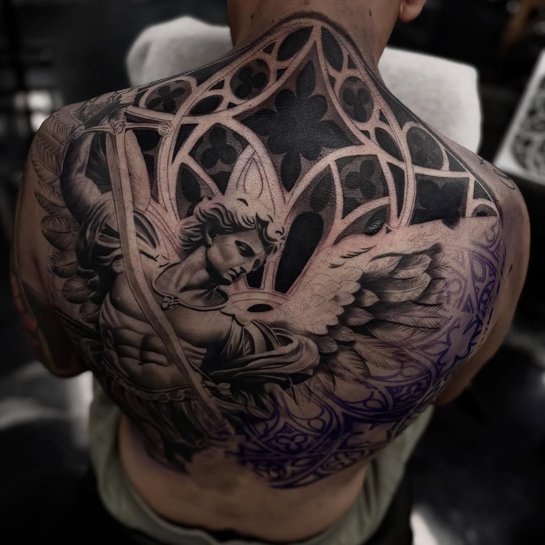 Tattoo by @angel_damiangg — realism, black_and_grey