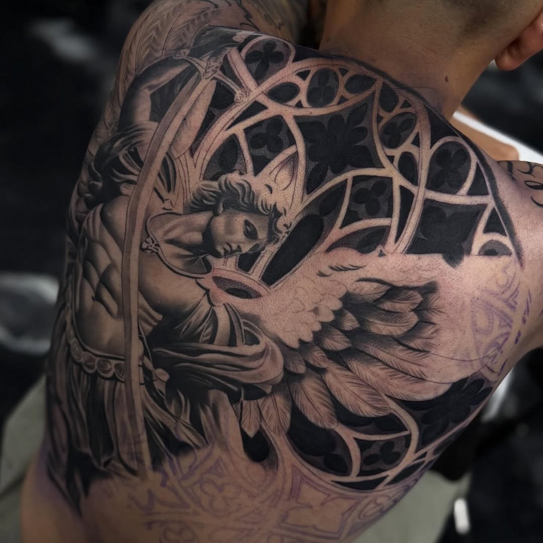 Tattoo by @angel_damiangg — realism, black_and_grey