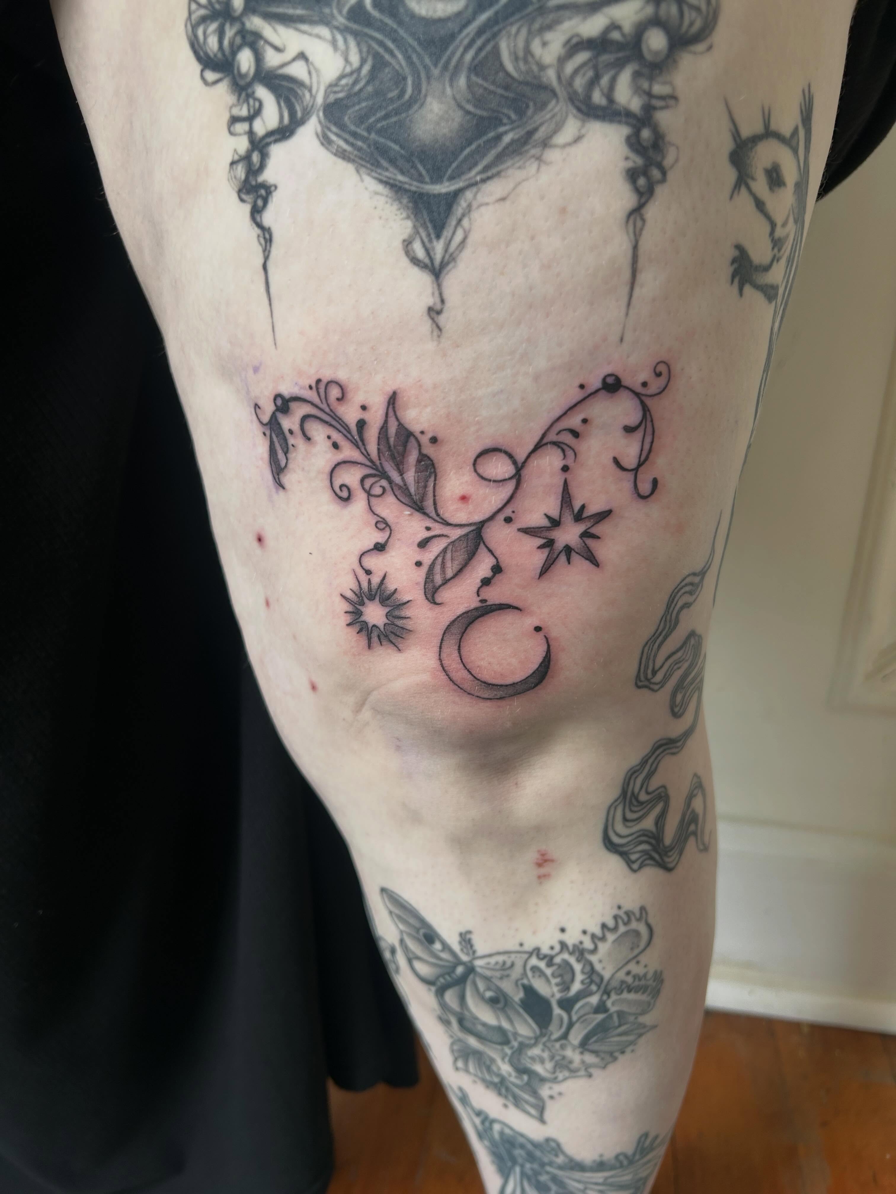 Moon and stars black and grey tattoo on the leg by Reilley Earles