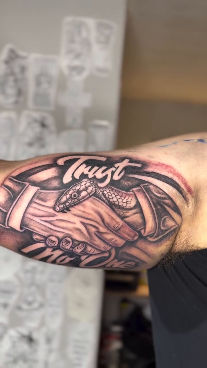 Surrealism tattoo on the forearm by jayden