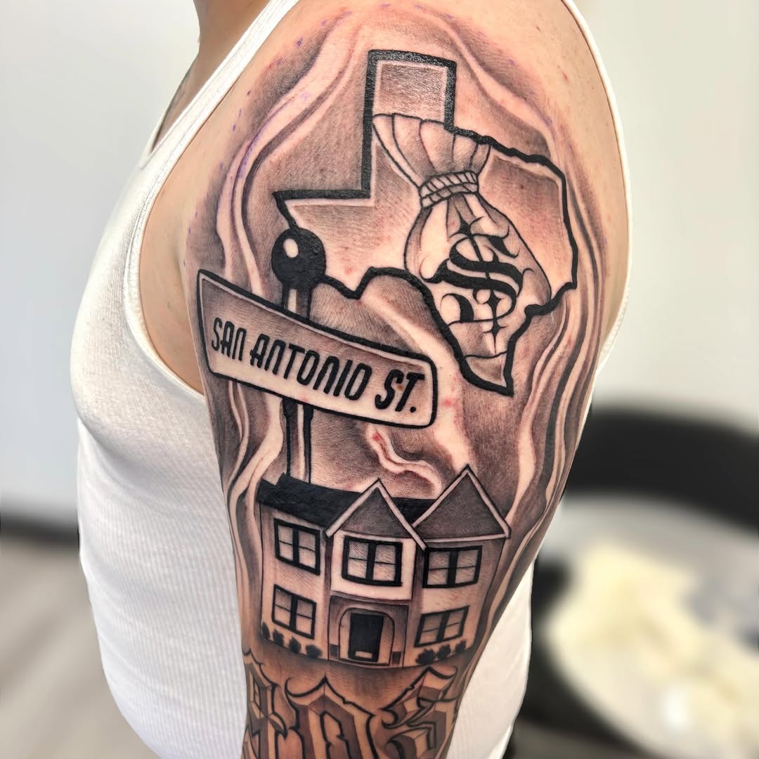 San Antonio street sign black and grey tattoo on the upper arm by Dallas Tattoo Artist