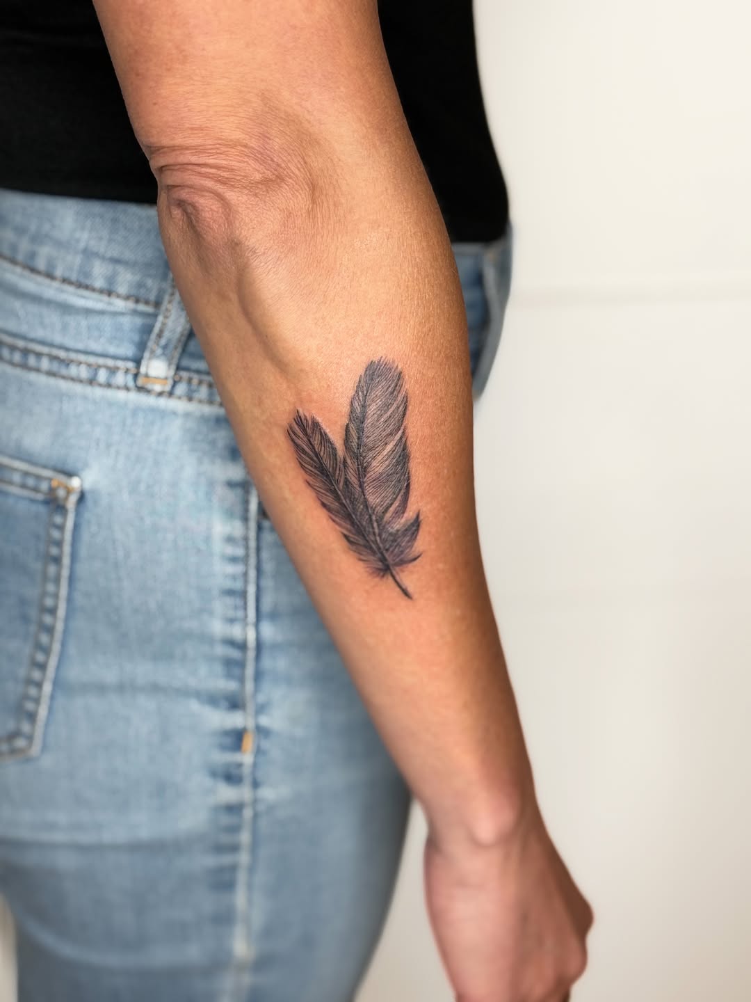 Two feathers fine line tattoo on the forearm by ❁ Marlo Marquise Tattoo Artist ❁