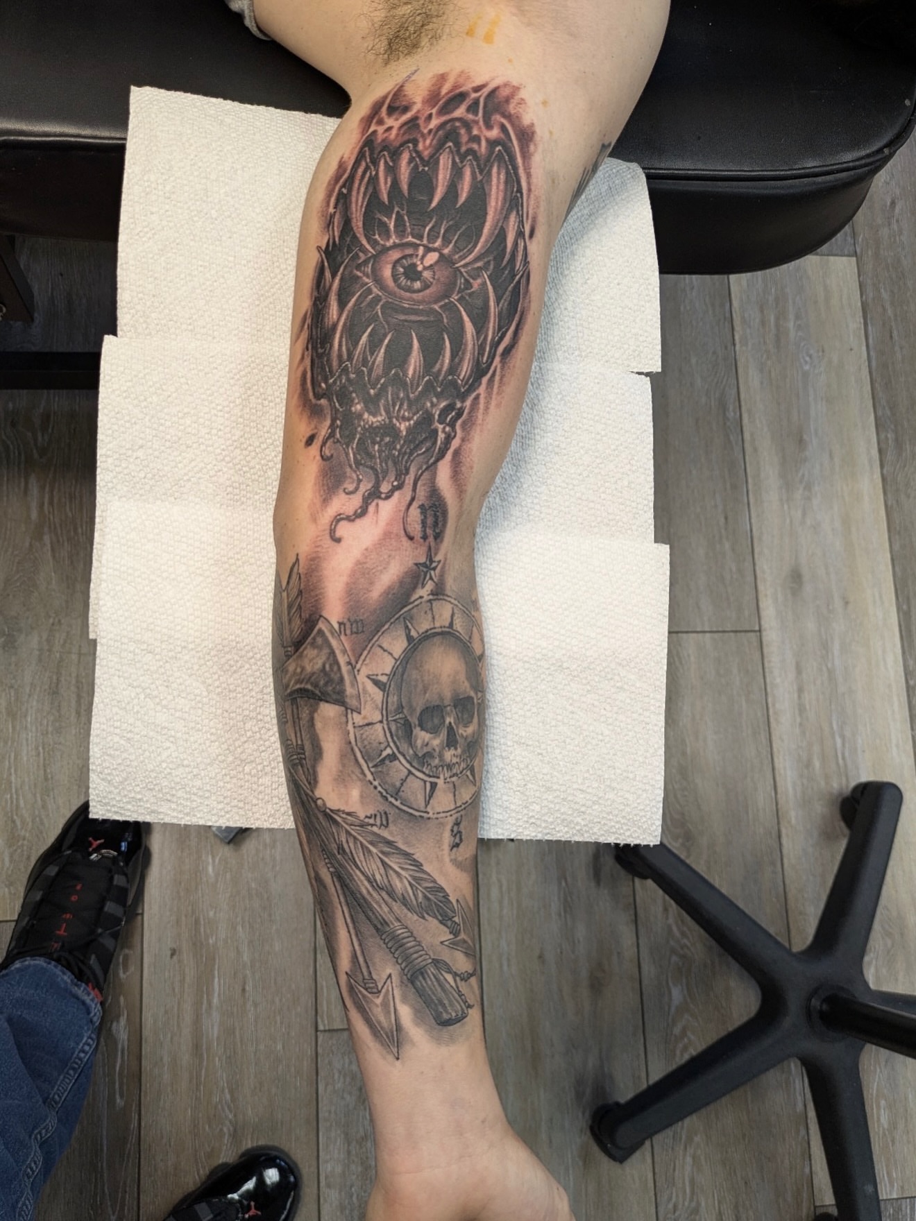 Eye and skull realism tattoo on the forearm by Buddy K.